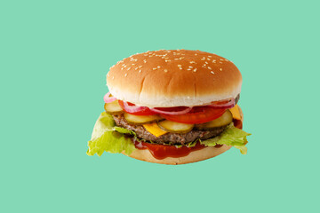 hamburger like in McDonald's with a beef cutlet on a green background, studio shooting 2