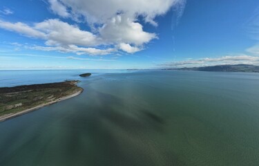 Fototapeta na wymiar Penmon Point, Anglesey. Wales, UK Irish Sea, lighthouse sunny day.