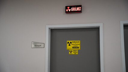 Hazard symbols in the radiology department in the hospital. mammography room radiation hazard