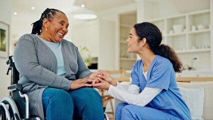 Home nurse, woman in wheelchair and talking, nursing and support in happy conversation and chat in living room. Medical caregiver or ADN student, patient with disability and holding hands for service