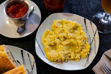 Portion of Ajoarriero de Cuenca, popular appetizer at Cuenca, Spain, made with salted cod, potatoes, breadcrumbs, boiled eggs, olive oil and garlic