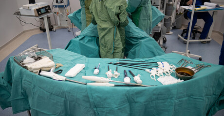 Laparoscopic surgery preparations and supplies. Nurse is preparing equipment for laparoscopic general surgery surgery