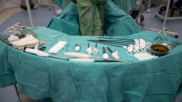 Laparoscopic surgery preparations and supplies. Nurse is preparing equipment for laparoscopic general surgery surgery