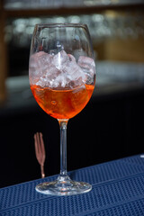 orange cocktail with ice