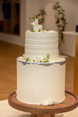 white  wedding cake decorated with flowers