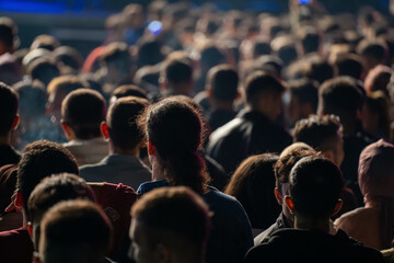 Heads of crowded people at the concert. - obrazy, fototapety, plakaty
