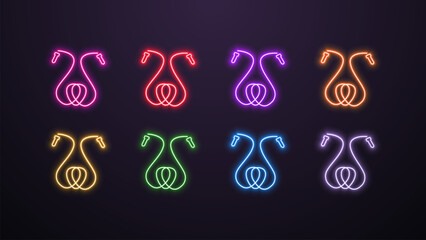 A set of neon jump rope icons in different colors on a dark background. Logo for sports. © Dmytro