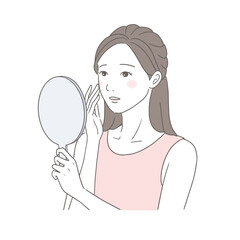 鏡を見てお肌の変化に悩む女性