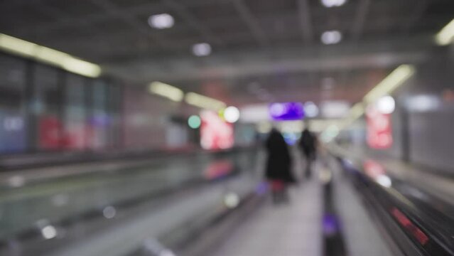 Autowalk in the airport - blurred footage