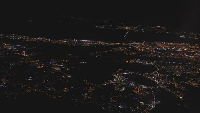 Bright lights of night city from a birds eye view