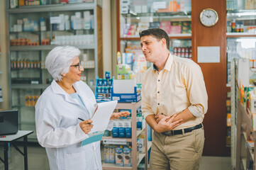 pharmacist is asking about a patient's condition in order to prescribe medication according to the...