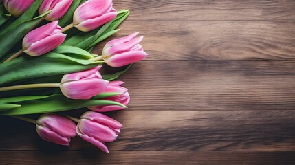 Obraz na płótnie Canvas Pink tulip bouquet on retro wooden background