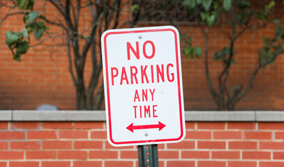 No Parking sign against a city backdrop, symbolizing urban restrictions and traffic control, with...