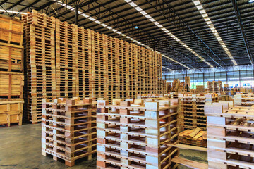 Warehouse Wonders, Stacks of Wooden Pallets Awaiting Shipment