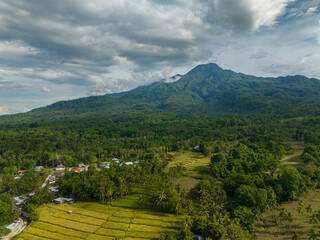 Fototapeta na wymiar Tropical mountain range and green hills with rainforest. Camiguin Island. Philippines.