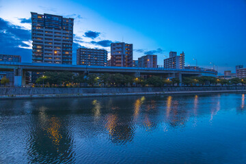 Fototapeta na wymiar 夕暮れ時の北九州小倉の空と景色