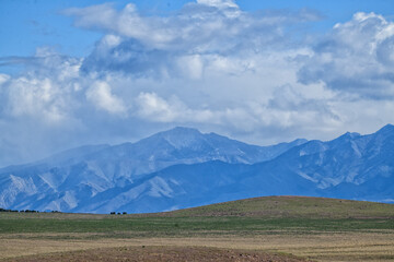 Clouds Brushing the Mountains