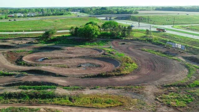 A Motocross Track Located On A Busy State Road, Aerial View.