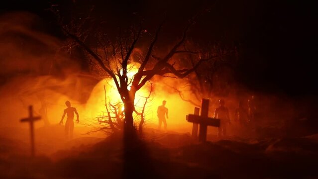 Silhouette of person standing in the dark forest with light. Horror halloween concept. strange silhouette in a dark spooky village
