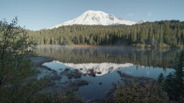 A Quite Lake with a Reflection of Majestic Mount Rainier with Beautiful Snow Cap on The Peak in Washington USA