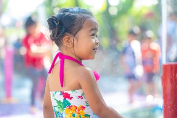Foto op Plexiglas Beautiful asian toddler girl enjoying play outdoor city water park © themorningglory