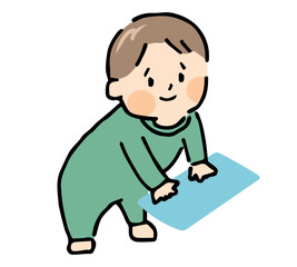 つかまり立ちをする男の子の赤ちゃん