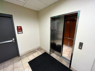 Stepping into an elevator © Nathan