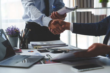Businessman shaking hands with partner. Greeting. Business joint venture concept. For business finance, investment, teamwork and successful business. - obrazy, fototapety, plakaty