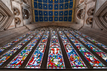 looking up at a stained glass window inside Carlisle Cathedral, Carlisle, Cumbria, UK