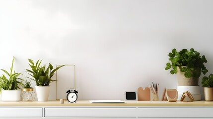Stylish desk interior with White table background with plant and leaves. Modern home office interior panoramic banner backdrop