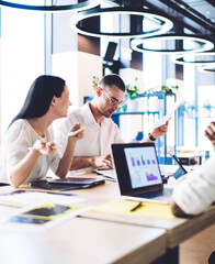 Creative diverse business team discussing project at meeting indoors