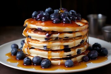 Fluffy pancakes topped with juicy blueberries and drizzled with sweet syrup. Generative AI