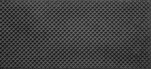 Black rubber texture background, square pattern