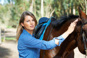 Smile, nature and portrait for woman with her horse on an outdoor farm for sports racing. Grooming,...