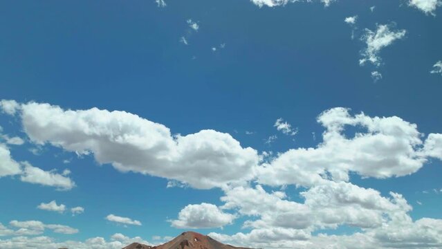 Opening scene Rocky Mountains pan down and up Aerial cinematic drone summer high altitude Red Mountain Pass Ouray Silverton Durango southern Colorado afternoon stunning blue sky partly cloudy