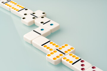 Lots of domino tiles on glass background