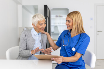 Healthcare and medical concept - doctor with patient in hospital. Doctor working in the office and listening to the patient, she is explaining her symptoms, healtcare and assistance concept