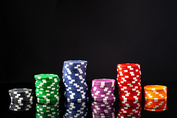 Poker chips on black background studio shot