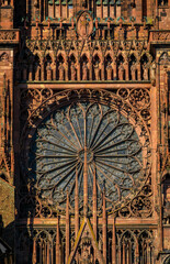 Ornate Gothic facade and the rose window of the Notre Dame Cathedral in Strasbourg, France, one of...