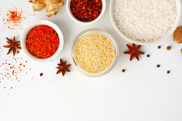 Beautiful composition with various spices on white background