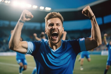 football player in a dark blue stripes uniform rejoices at a goal scored in a stadium filled with spectators