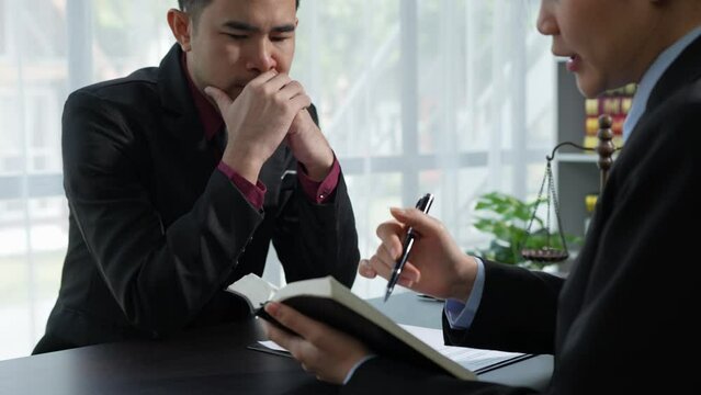 Lawyer or legal advisor finalizes the contract. Business legal agreements, constraints, consulting between lawyers and business clients, tax and legal firms. the concept of righteousness and justice
