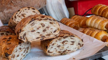Freshly baked bread with raisins on sale at the Italian fine food market