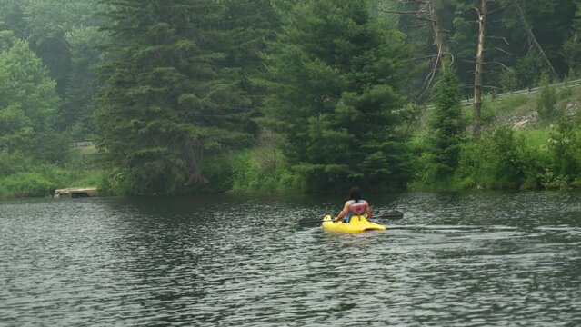 Paddling in smoke during summer vacation on the Muskoka river