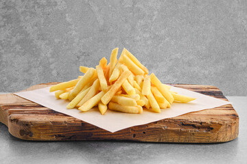 Portion of french fries on paper