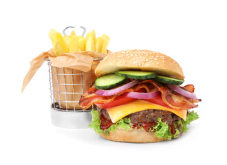 Tasty burger with bacon, vegetables and patty served with french fries isolated on white