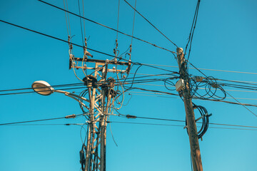 Street light with electricity utility pole and electrical wires