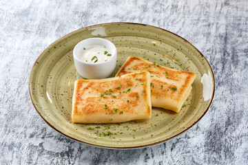 pancakes with sour cream closeup