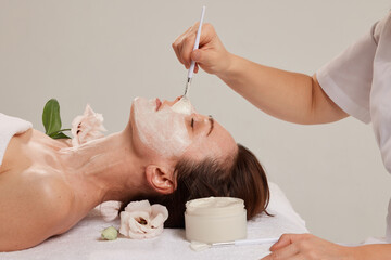 Professional face care brush for cosmetic procedures that evenly distributes the cream for the face...