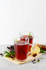 Herbal Tea, Red Tea in Glass Mugs, Autumn or Winter Drink